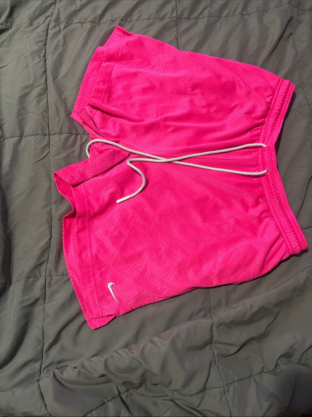Nike Women's Bright Pink Athletic Mesh Shorts with White Swoosh